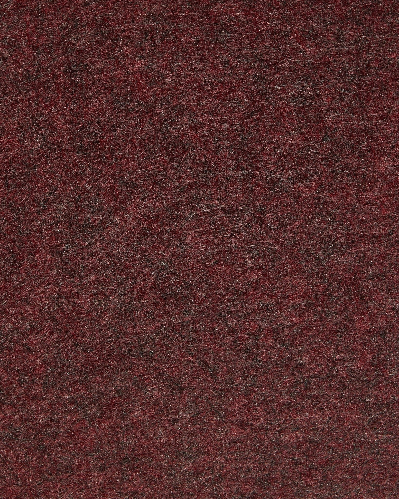 Close-up van WoodUpp Vigg | Felt Box / BM2 in ox red, waarbij akoestisch vilt met textuur, subtiele kleurnuances en zichtbare vezels wordt uitgelicht.